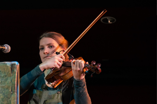 Anna Hughes playing a violin Anna Hughes playing a violin